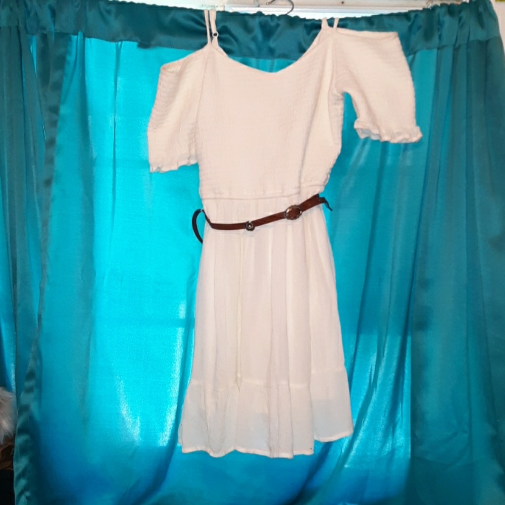 A white off the shoulder dress; belt incuded.
